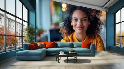 Confident Young Woman with Curly Hair Wall mural