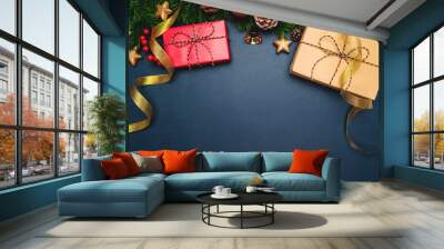 Christmas present and pine tree with xmas decoration on blue bac Wall mural