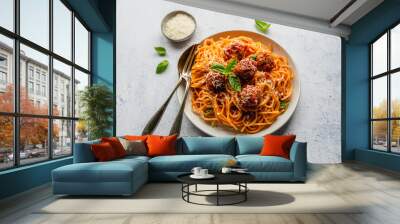 Close up of plate of spaghetti and meatballs on light background. Wall mural