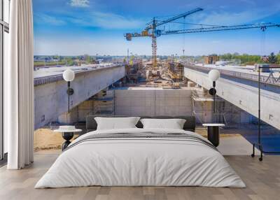 Construction of a new highway. Aerial view. Viaduct in progress Wall mural