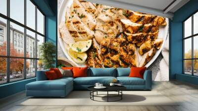 Overhead of two types of sliced grilled chicken breast Wall mural