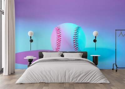 Baseball in blue and purple lighting with copy space for sports art or background. Wall mural