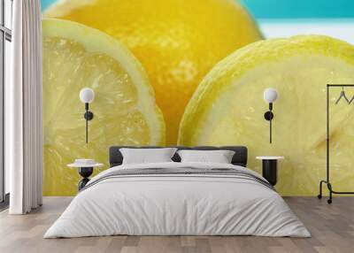 Lemon citrus fruit slices in bright yellow closeup. Wall mural