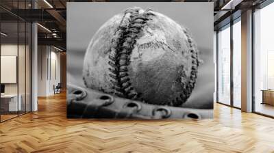 Old leather baseball ball in black and white used in sport. Wall mural