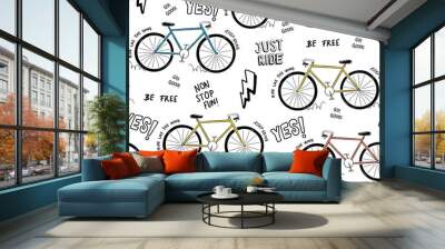 Vector Seamless pattern with bicycle illustration and slogan text, for t-shirt prints and other uses. Wall mural