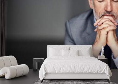 He always thinks before he acts. Cropped shot of a mature businessman looking pensive in his office. Wall mural