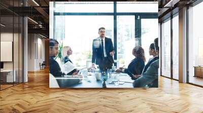 I actually have a solution for that. Cropped shot of a handsome mature businessman giving a presentation in the boardroom. Wall mural