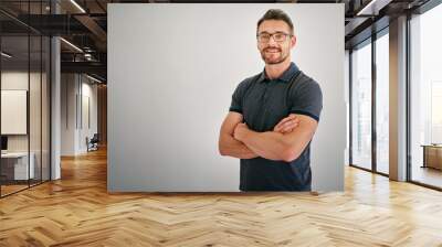 In the prime of my life. Cropped portrait of a mature man standing against a gray background. Wall mural