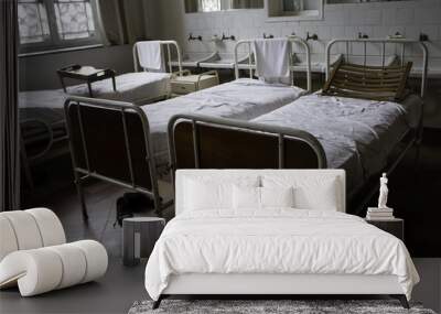 Old hospital beds Wall mural