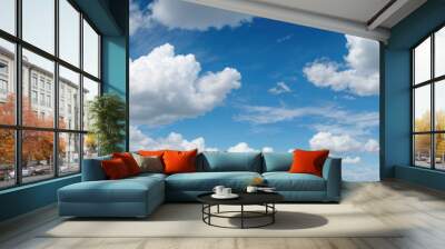 blue sky background with clouds. wide web banner. Blue sky and white clouds floated in the sky on a clear day with warm sunshine combined with cool breeze Wall mural