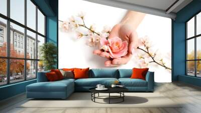 Natural hand cream concept with blooming pink flower, skincare beauty treatment, moisturizing floral essence, fresh cherry blossoms, isolated on white background Wall mural