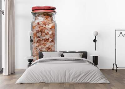 Himalayan pink salt in Spice Rack Glass bottle with red cap isolated on white background with room for copy Wall mural