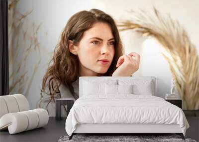 woman making difficult decision, reasoning, weighing pros and cons Wall mural