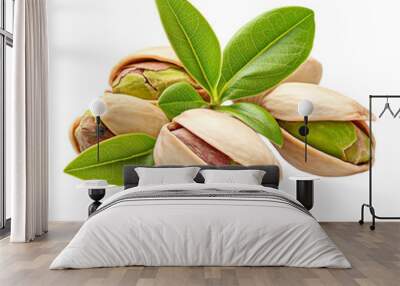 Pistachios in shell with leaves isolated on transparent or white background  Wall mural