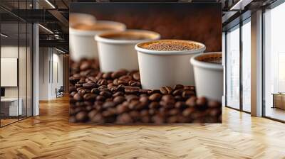 Row of Coffee Cups on Coffee Beans Background  Wall mural