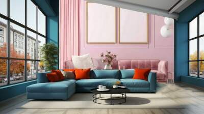 A pink living room with a plush velvet sofa. a coffee table. a vase of flowers. and two blank picture frames Wall mural