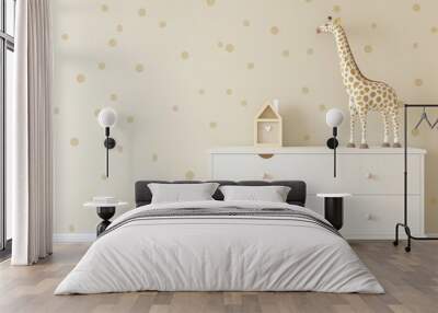 A white dresser with two drawers stands against a beige wall with polka dots A wooden house and a giraffe figurine are on top of the dresser Wall mural