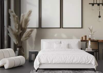 Minimalist interior design with three blank frames on a wall, perfect for showcasing your art or designs. The neutral color scheme and modern furniture create a stylish and inviting atmosphere. Wall mural