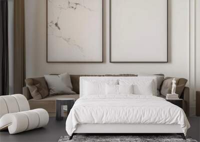 Minimalist living room interior with a brown velvet sofa. a coffee table. and two framed artworks Wall mural