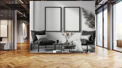 Modern and minimalist living room interior with two empty picture frames, black armchairs, and stylish decor. Wall mural