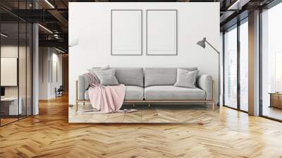 Modern living room interior with grey sofa, two blank frames and wooden floor Wall mural