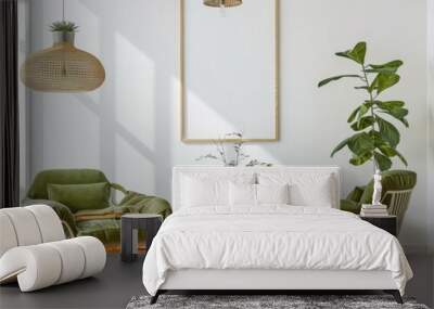 Two green armchairs with throw blankets and a coffee table with vase of flowers and books in a modern living room with a large blank frame on the wall Wall mural