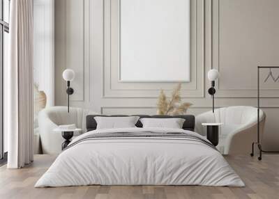 Two white armchairs with pillows and a round coffee table with dried pampas grass in a vase in a white living room with a blank poster on the wall Wall mural