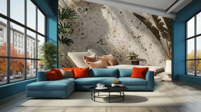 Two wooden lounge chairs with white cushions on a terrazzo patio with a textured stone wall. Wall mural