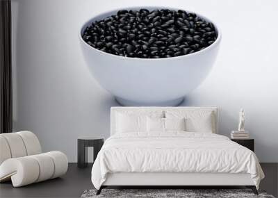 close-up in white bowl with black beans isolated Wall mural