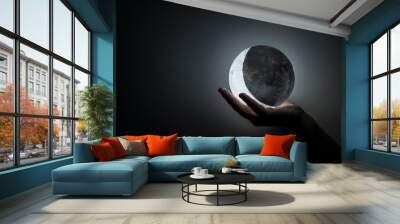 Eclipsed moon in the hand Wall mural