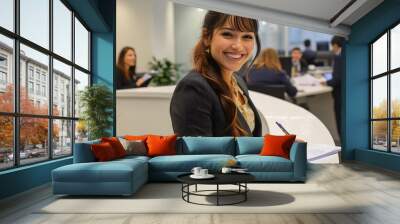 attractive hispanic woman in her late thirties, wearing business casual attire and smiling Wall mural