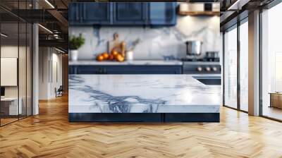 Marble kitchen countertop with blue cabinets and blurred background  Wall mural