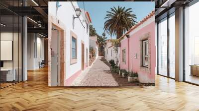 Photo of a street with white houses and pink walls  Wall mural