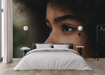 a young woman with an afro hair style Wall mural