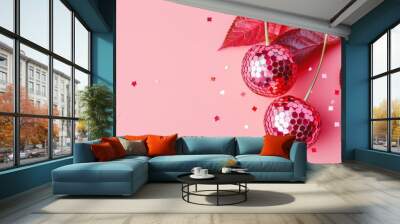 two cherries that are disco balls on a pastel light red background
 Wall mural