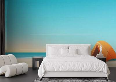 A tent set up on a sandy beach with a view of the ocean waves and a campfire nearby. Wall mural