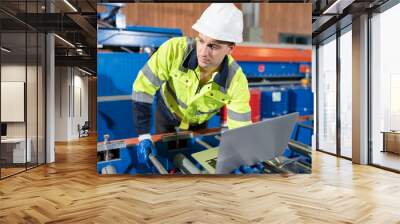 Portrait caucasian engineer man use notebook computer working and control machine at metal sheet factory	 Wall mural