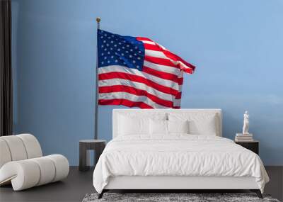 American Flag waving on pole, with bright vibrant red white and blue colors Wall mural