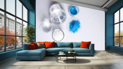 Inorganic chemical on white laboratory table. Copper(II) sulfate, Microcrystalline wax, alcohol. Chemical ingredient for Cosmetics and Toiletries product. Top View Wall mural