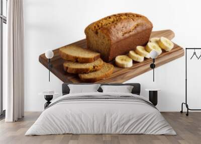 A loaf of banana bread with slices cut out on a wooden board isolated on transparent background Wall mural