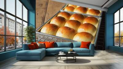 Shiny and golden brown bread rolls in baking tin. Wall mural