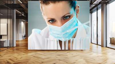 Female scientist working in laboratory Wall mural