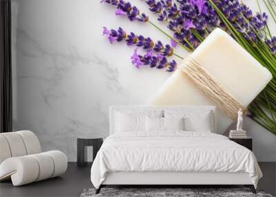 2409_086.an elegant flat lay featuring a mild soap bar alongside fresh lavender and chamomile flowers, emphasizing the natural ingredients and soothing properties suited for sensitive skin Wall mural