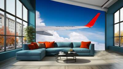 The wing aircraft in altitude during flight Wall mural