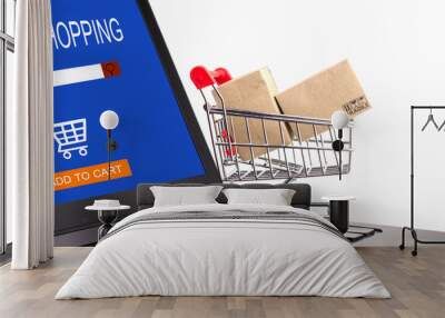 Many boxes in a trolley on a white background. Ideas online shopping is a form of electronic commerce that allows consumers to directly buy goods from a seller over the internet. Wall mural