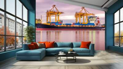 Harbor with anchored ship. Container cargo freight ship with working crane bridge at a shipyard in for logistic transportation import and export at Asia haven port background, Samutprakarn, Thailand. Wall mural