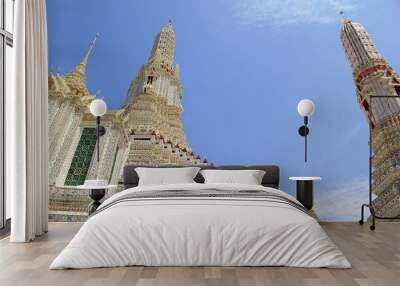 The scenery inside Wat Arun com pagoda, both small and big white background bright sky. Wall mural