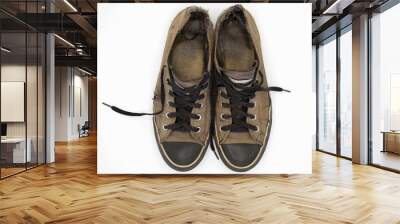 Black Sneakers worn isolated on white background Wall mural