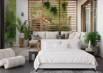 A modern wooden terrace with a white sofa and wood slats on the wall, a wooden floor, a side table with plants in pots, a garden light, in the style of Scandinavian Wall mural