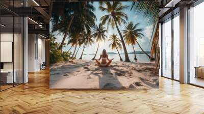 Back view of young woman, full body, doing yoga at beach during sunset, the paradise islands by the sea, calm and zen Wall mural